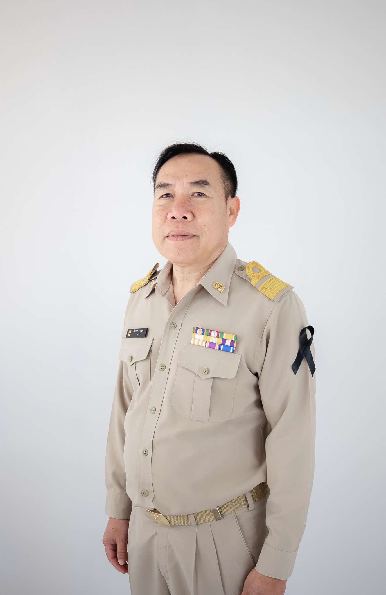 รูปนายไพเราะ กุลภา